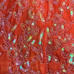 Women’s prom dress, size 000. Brand primavera couture. Orange sequent.